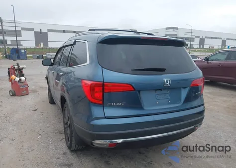2016 Honda Pilot Touring z USA, uszkodzony, nr VIN 5FNYF5H92GB008209